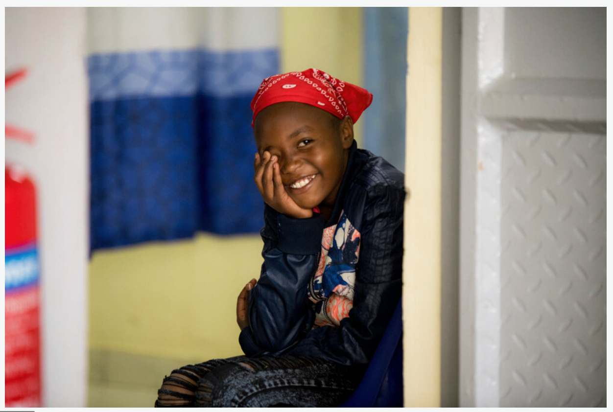 A smiling child during an eye-health program